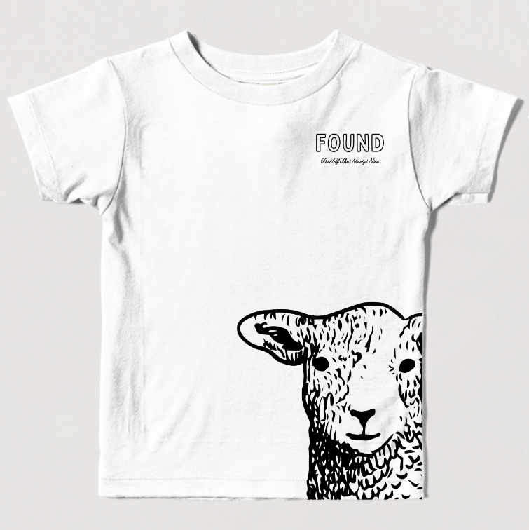 white t-shirt with a lamb graphic and text on a light gray background